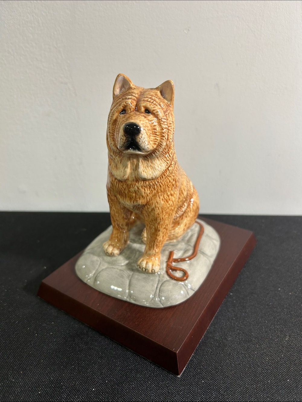Royal Doulton chow dog on wood base